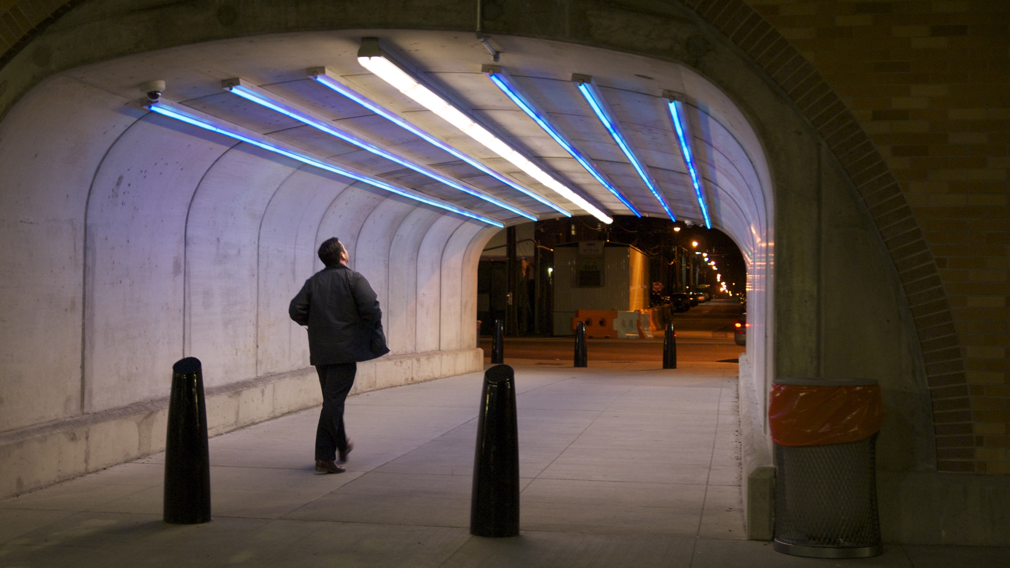 New pedestrian tunnel on Clinton Street underneath the rebuilt viaduct, illuminated by newly-installed LED uplighting.